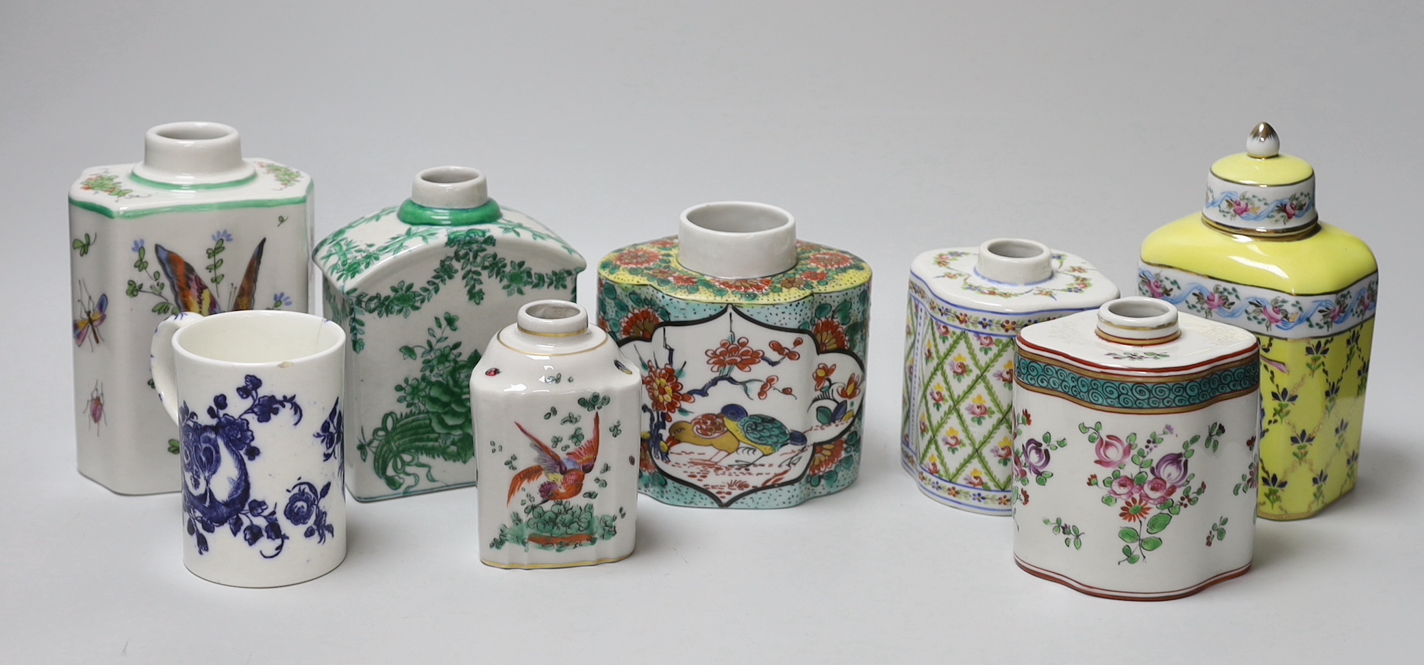 A group of seven floral Continental tea canisters (one with cover) and a Worcester style bone china mug, the largest 15.5cm high